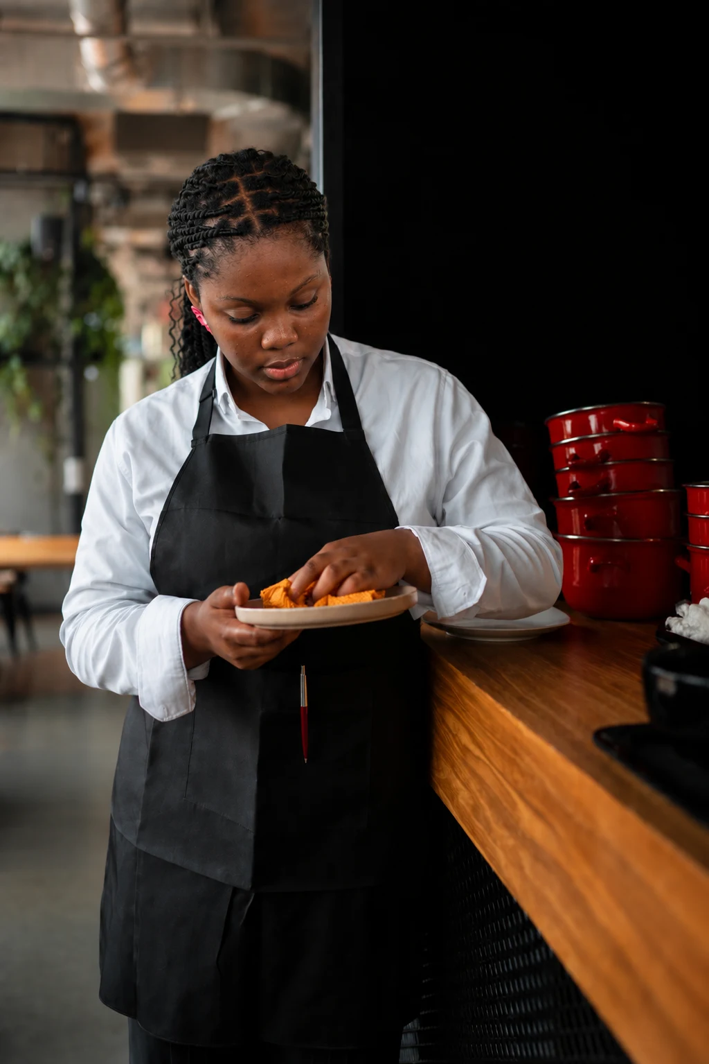 SendAm merchant partner preparing food in a kitchen