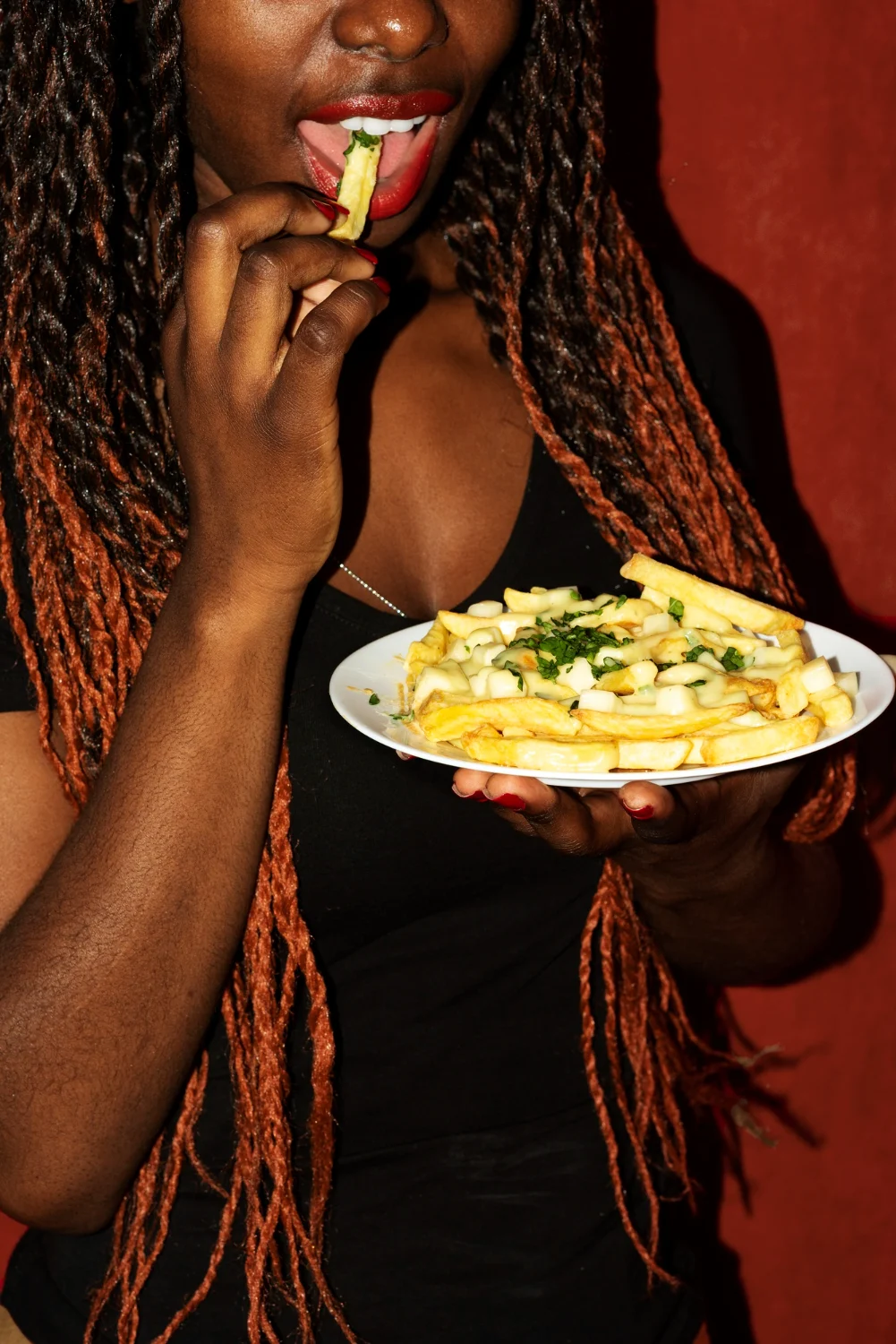 Merchant enjoying food from their business